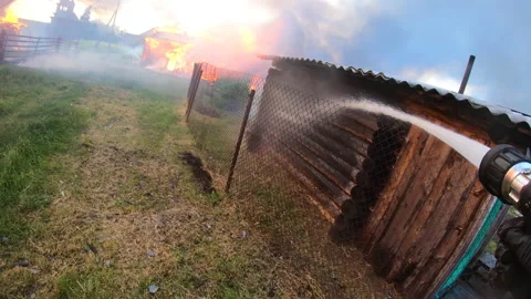 Massive fire in the village.Work of firefighters. Stock Footage 157558369
