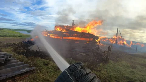 Massive fire in the village.Work of firefighters. Stock Footage 157558646