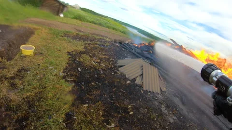 Massive fire in the village.Work of firefighters. Stock Footage 157558751