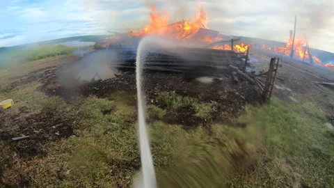Massive fire in the village.Work of firefighters. Stock Footage 157558766