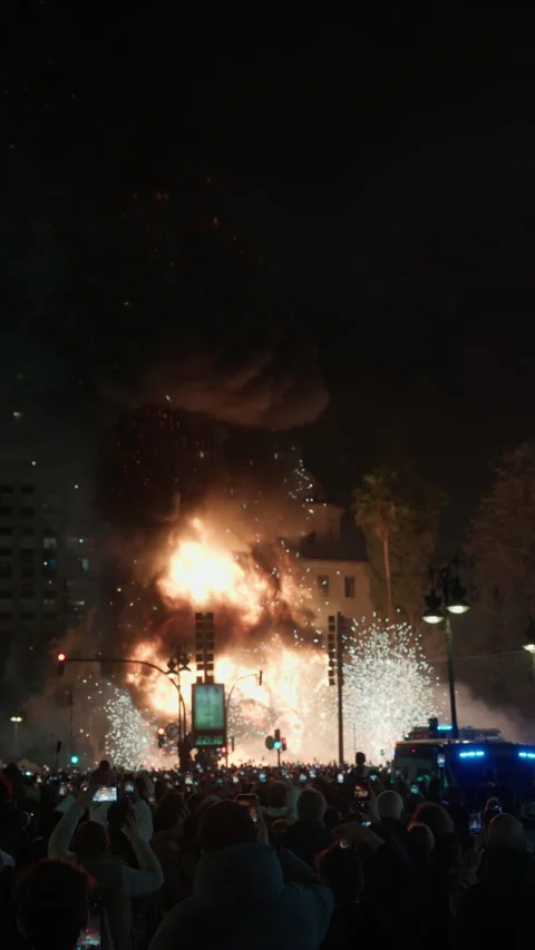 Massive fireball and sparks erupting during Las Fallas La Crema Valencia Stock Footage 334294545