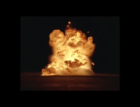 Massive Fireball Explosion with Billowing Smoke VFX Overlay Against Black Stock Footage 335384595