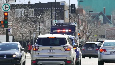Massive firetruck passing with lights and sirens Stock Footage 139664286