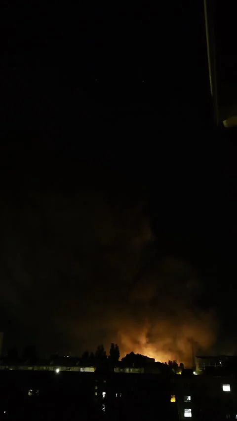 Massive flames and smoke after drone strike at night Stock-Footage 312415069