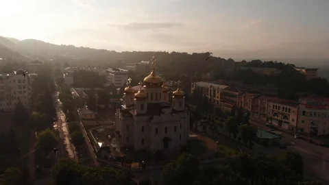 Massive flock of birds attacking a drone flying over the city Stock Footage 91094248