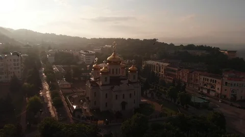 Massive flock of birds attacking a drone flying over the city Stock Footage 95647358