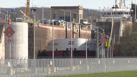 Massive freighter cargo container ship sailing the Welland canal Видео 153342308