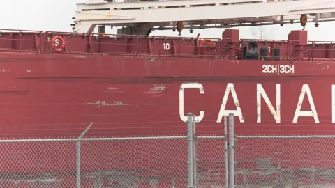 Massive freighter cargo ship sailing up the Welland canal Видео 152073362