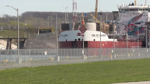Massive freighter cargo ship sailing the Welland canal with supply chain goods 스톡 동영상 153379870
