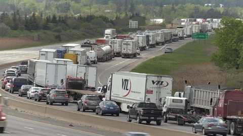 Massive gridlock traffic jam in the highway west of Toronto Stock Footage 108802209