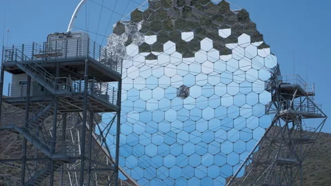 Massive hexagonal mirror array at Roque de los Muchachos Observatory reflecting Stock Footage 311806759