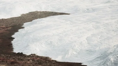 Massive ice field covers rocky landscape in unknown location Stock Footage 344060112