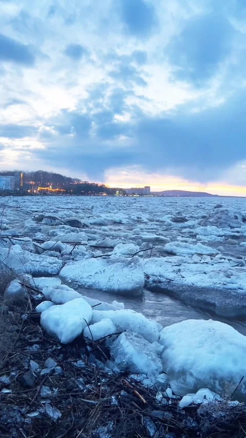 Massive Ice Floes Breaking Up and Drifting on River at Sunset, Northeast China Stock Footage 337330961