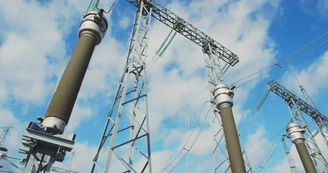 Massive metal structures and power lines at the power plant, modern, 4k Stock Footage 144824747