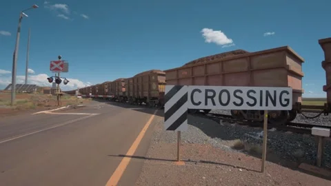 Massive Mining Train Zooming Along Railroad Stock Footage 315973014