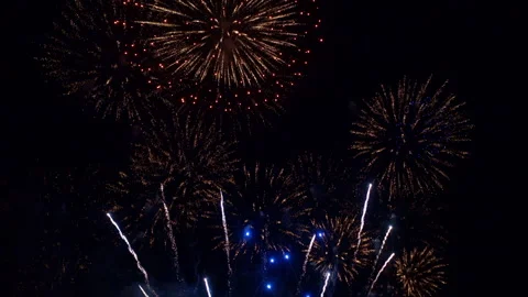 A massive number of fireworks explode in... | Stock Video | Pond5