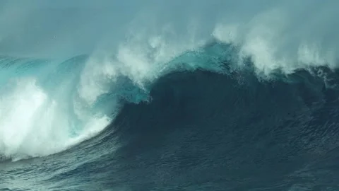 Massive ocean wave breaking in the deep blue sea Stock Footage 339132750