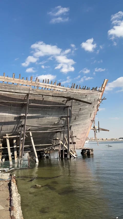 A massive, old, partially decayed wooden ship, weathered by time and the elem Video stock 301859683