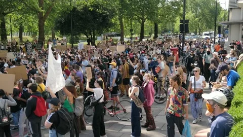 MASSIVE PAN OF CROWD AT BLACK LIVES MATTER RALLY OVERHEAD IN LONDON UK, 4K Stock Footage 133146935