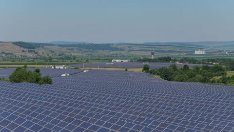 Massive Photovoltaic Array Capturing Intense Solar Energy on a Hot Summer D.. Stock Footage 338989086