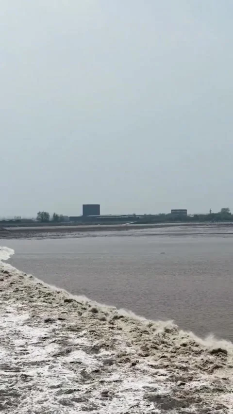 Massive Qiantang River Tidal Bore Wave Rolling In, Hangzhou, Zhejiang, China Stock Footage 337385419