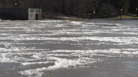 Massive river flooding during record warm temperatures in Ontario Canada Stock Footage 150241054