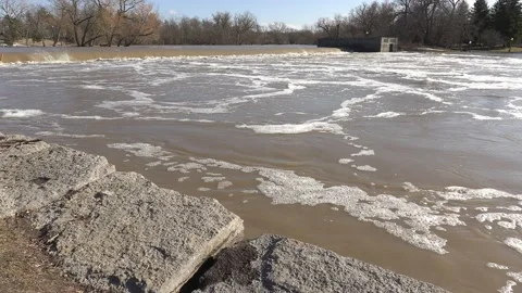 Massive river flooding during record warm temperatures in Ontario Canada Stock Footage 150241117