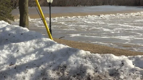 Massive river flooding during record warm temperatures in Ontario Canada Stock-Footage 150241949