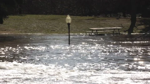 Massive river flooding during record warm temperatures in Ontario Canada Stockbeeldmateriaal 150242250