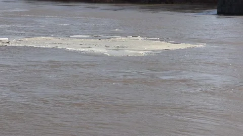Massive river flooding during record warm temperatures in Ontario Canada Stock Footage 150242342