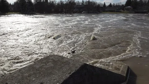 Massive river flooding during record warm temperatures in Ontario Canada 스톡 동영상 150242382