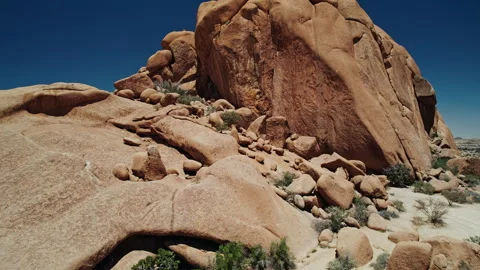 Massive Rock Formation in African Desert Captured by Drone Stock Footage 301368896