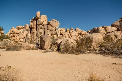 Massive rock formations, where large boulders are stacked one on top of another Stock Photos