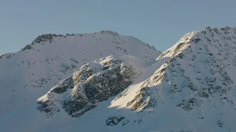 Massive rocks and snow form the Alps during winter Stock Footage 101909093