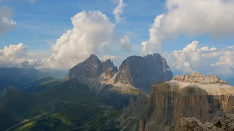 Massive rugged mountain peaks towering over deep valleys outdoors Video stock 342328735