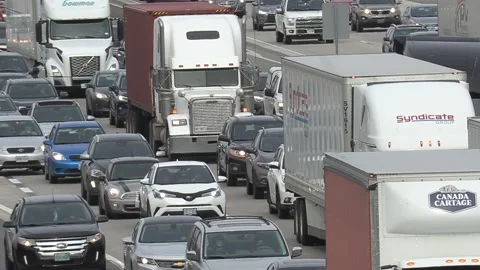 Massive rush hour highway traffic jam with cars and trucks on the road 库存影片 151058615