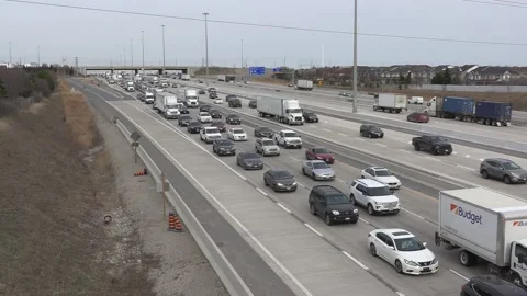 Massive rush hour highway traffic jam with cars and trucks on the road Stockbeeldmateriaal 151058853