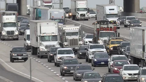 Massive rush hour highway traffic jam with cars and trucks on the road 库存影片 151058984