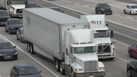 Massive rush hour highway traffic jam with cars and trucks on the road Stockbeeldmateriaal 151059254