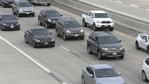 Massive rush hour highway traffic jam with cars and trucks on the road 動画素材 151059313