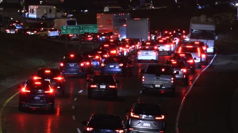 Massive rush hour traffic jam gridlock on highway at night Stock Footage 144643519