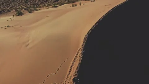 Massive sand dune ridge with sharp crest at Singing Dune, Altyn Emel Stock Footage 345410177