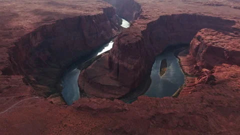 Massive Sandstone Rock with River Bend Aerial Perspective Stock Footage 317330278