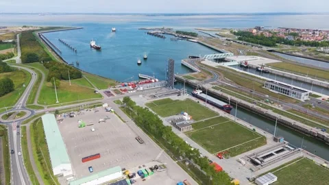 Massive sea lock system raised drawbridge allow industrial vessels navigate Stock Footage 327651116