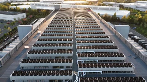 Massive server farm rooftop in Ashburn, Virginia at sunset, with rows of Stock Footage 333717649