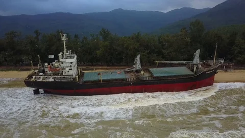Massive ship wrecked on the beach | 4k Drone Stock Footage 100262661