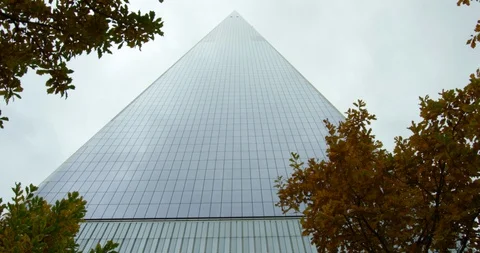 Massive Skyscraper From Classic NYC Streets With Beautiful Autumn Trees In Park Stock Footage 112330261