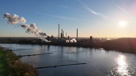 Massive smoke release from coking tower at dawn Stock Footage 331202318
