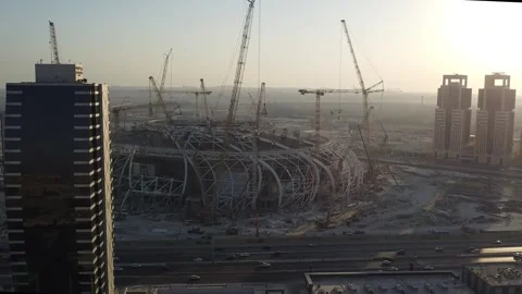 Massive Stadium Construction Site at Sunset in Saudi Arabia Stock Footage 334572390