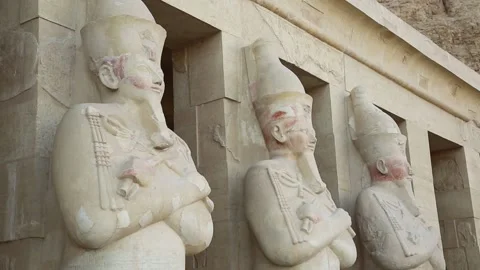 Massive statues in an ancient egyptian Temple of Karnak, tourism Stock Footage 154253093